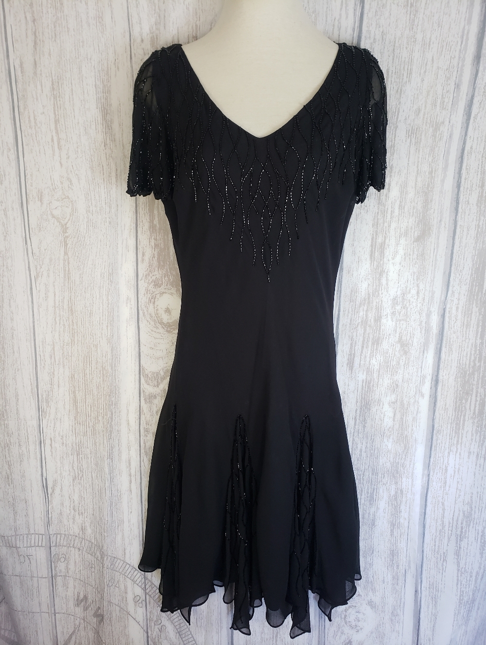 J Laxmi black beaded dress featuring a hanky hem Lined Stretchy Sz 10  90s Y2K